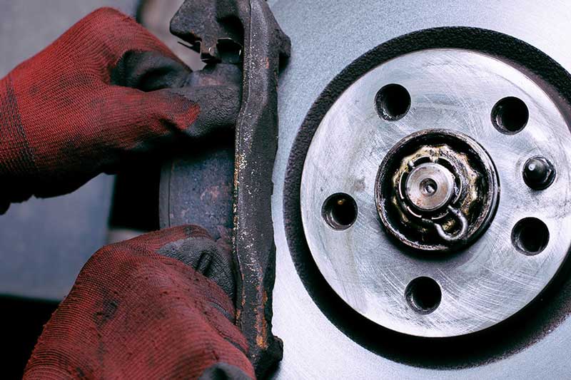 A close up of vehicle brakes - Essential Maintenance FAQ: Keeping Your Chevy in Top Condition
